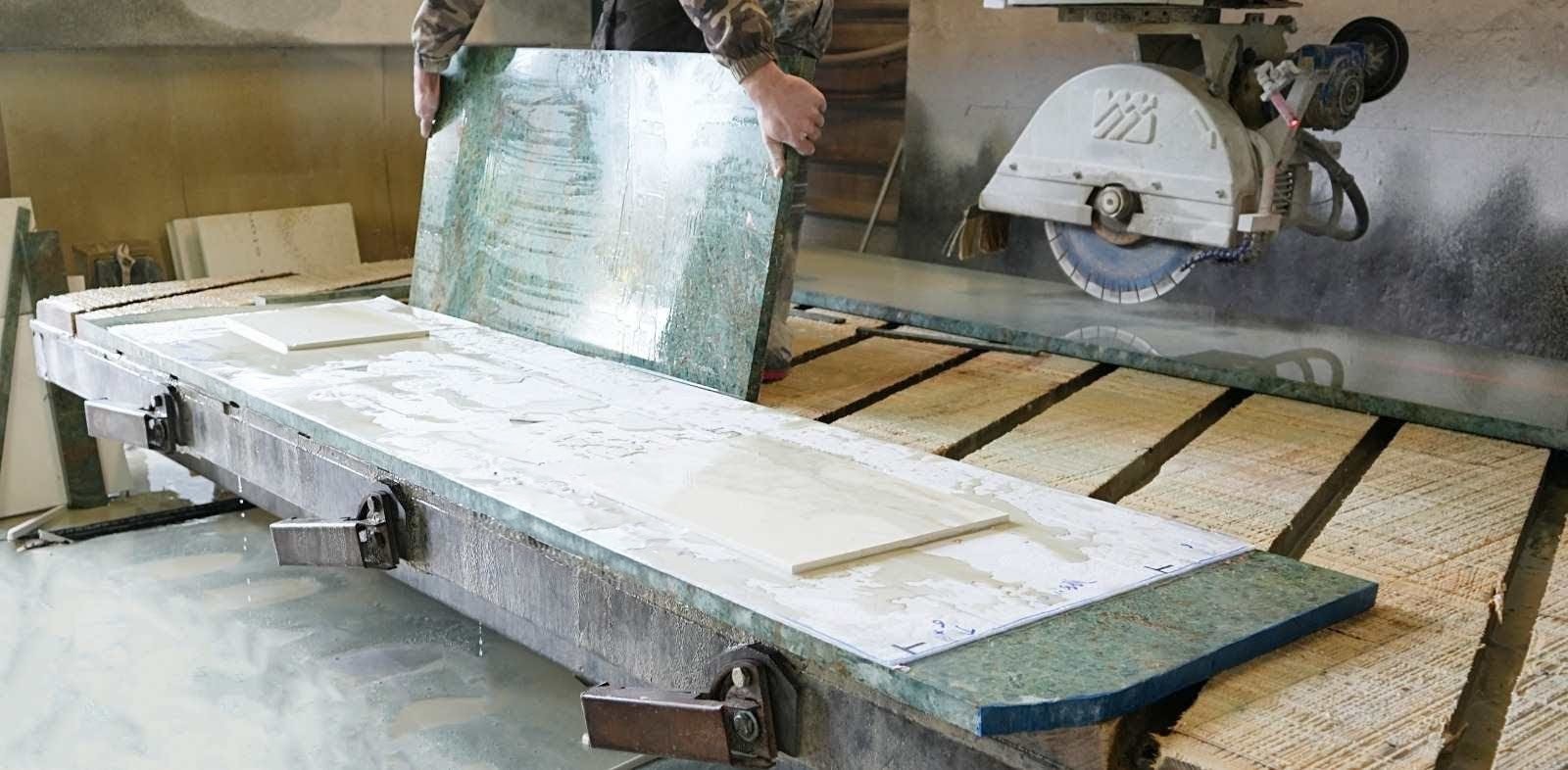 Stone slab being cut with a precision saw